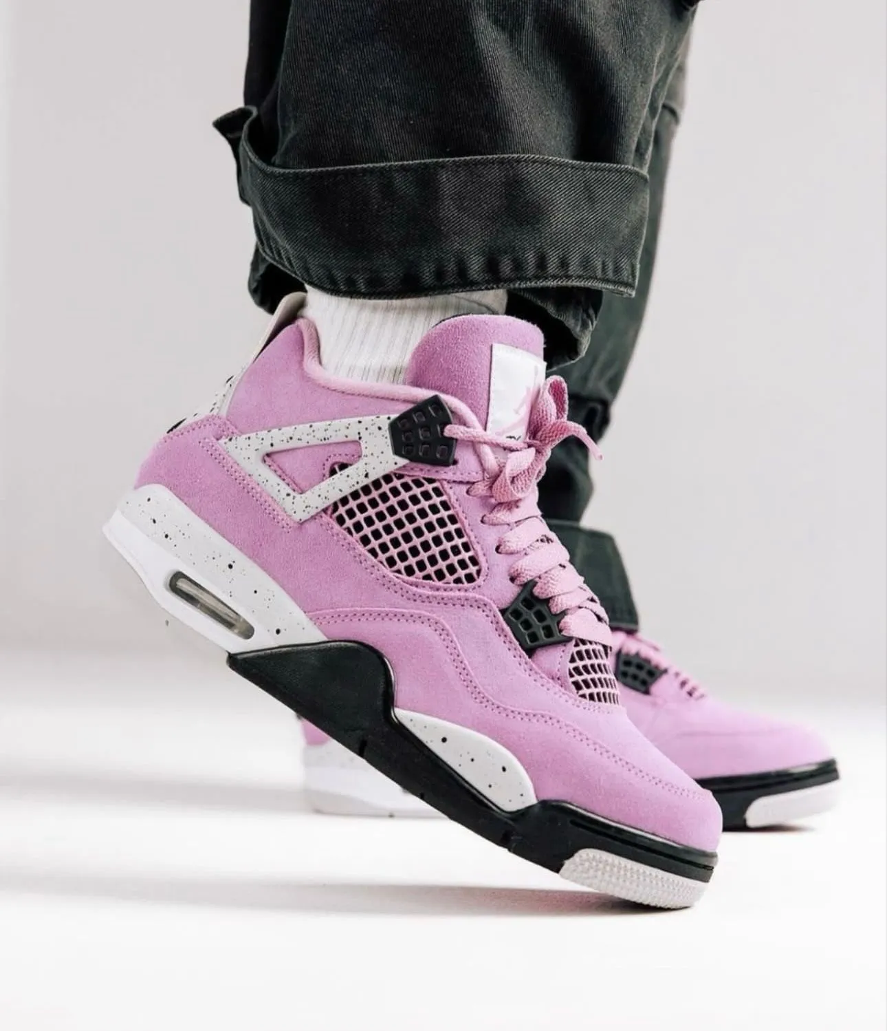 "Nike Air Jordan 4 Orchid – Bold Style, Premium Comfort, Limited Edition!''
