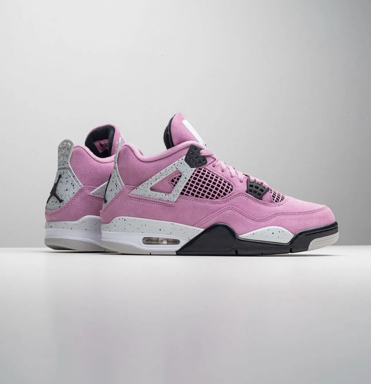 "Nike Air Jordan 4 Orchid – Bold Style, Premium Comfort, Limited Edition!''